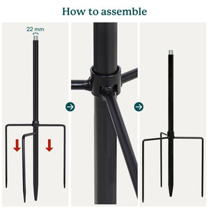 Step-by-step assembly guide for a black metal stand with prongs, showing measurements and arrows.
