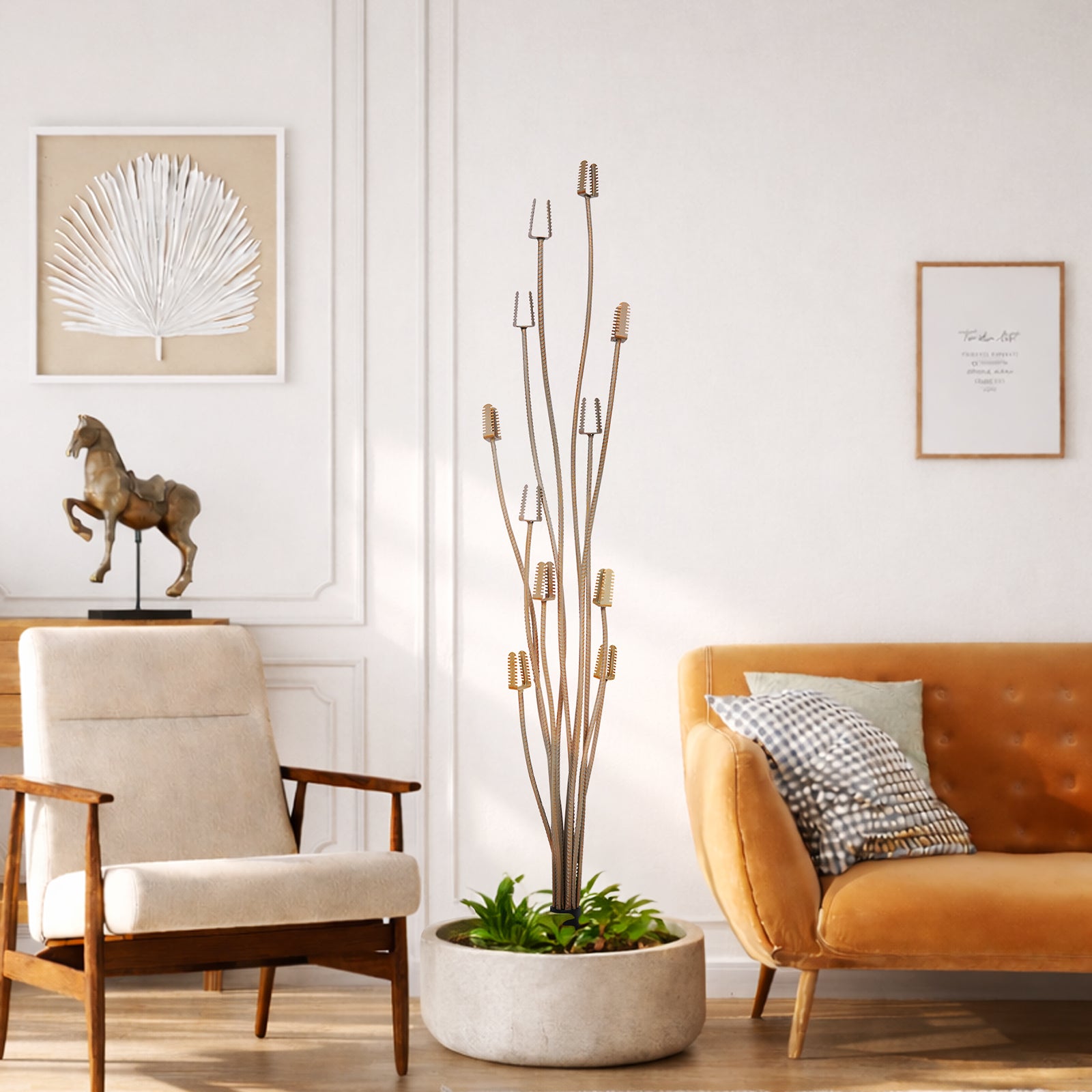 Living room with a chair, plant, and sofa, featuring decorative elements.