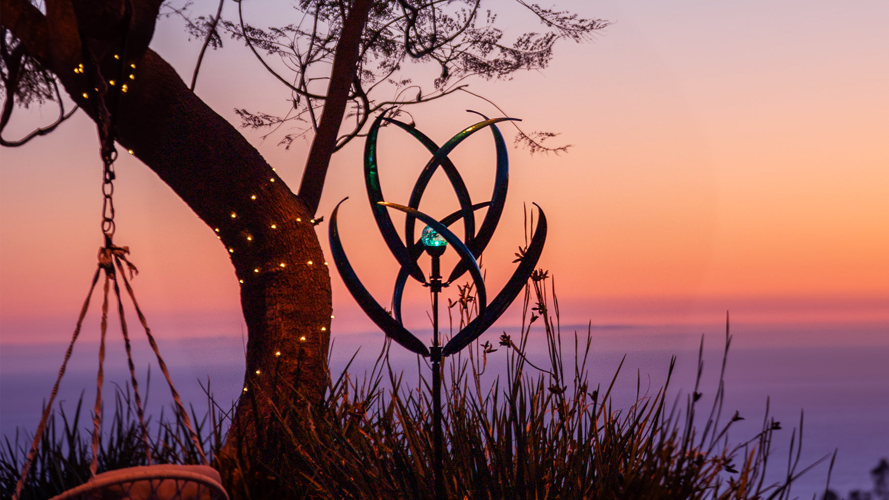 Embrace nature with the Dawn Magnolia Wind Spinner