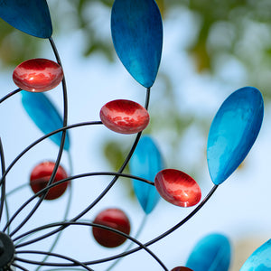 Wind spinner in blue and red, garden art