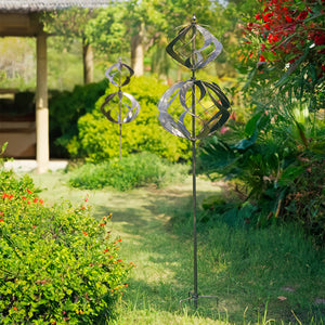 Stainless Steel Wind Spinner Kinetic in patio, sunshine afternoon
