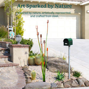 Decorative metal sculpture of plants in a garden