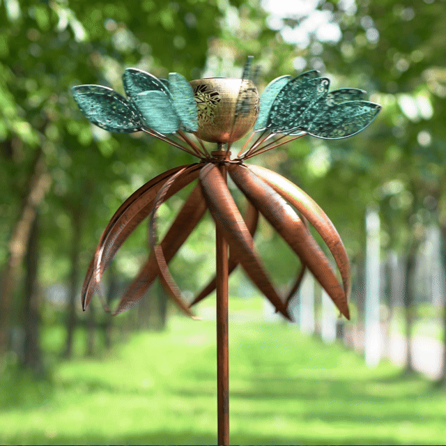 A windmill as graceful as a ballet skirt dances elegantly in the garden.