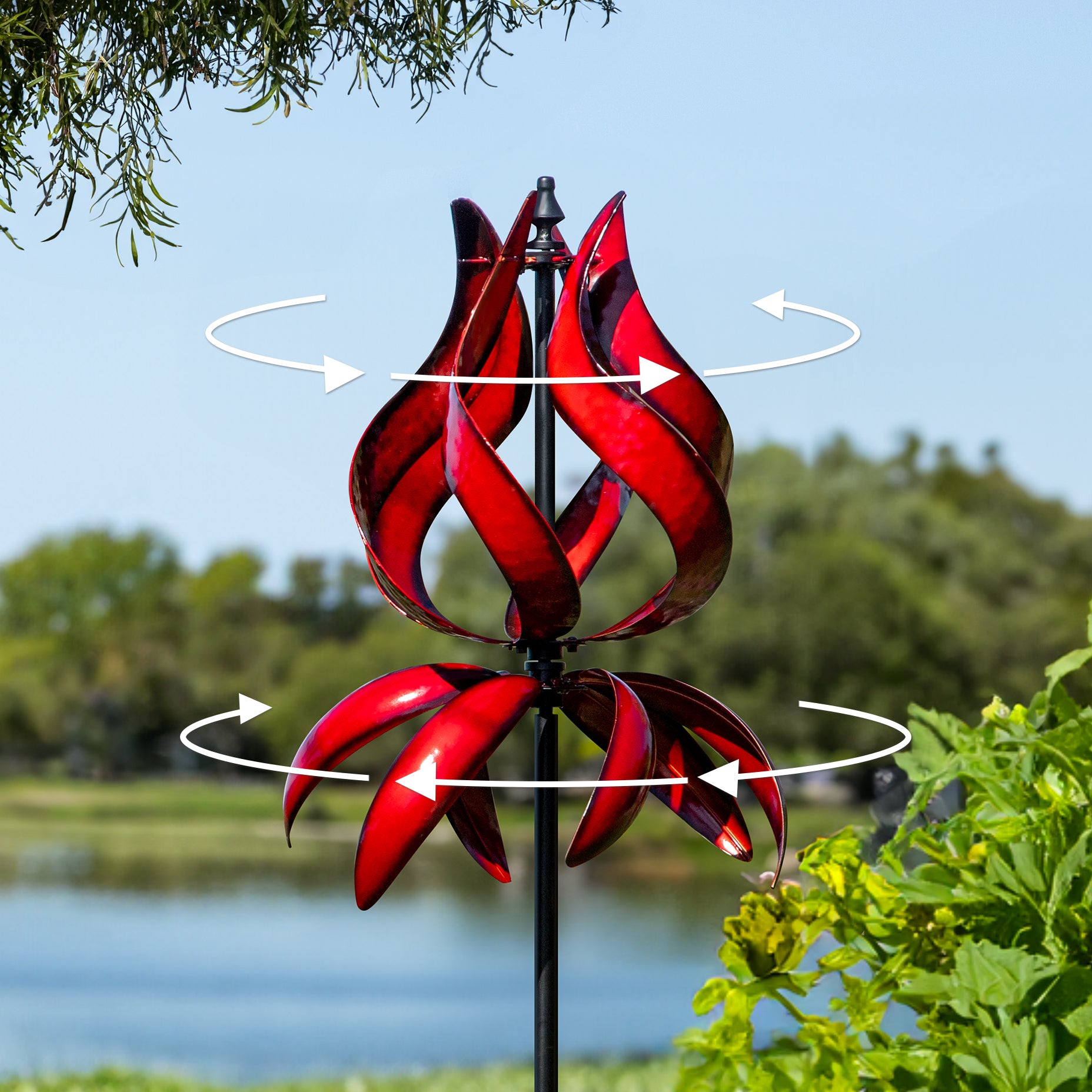 Red tulip wind spinner in garden