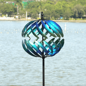 yard art spinning near to the lake